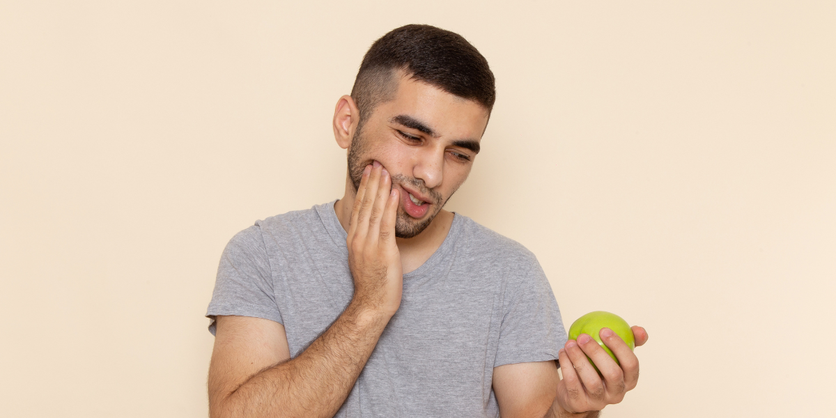 Why Does My Tooth Hurt When I Bite Down? Causes and Treatment Options