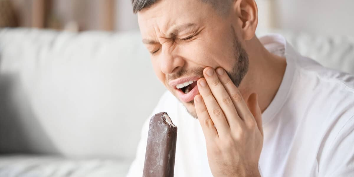 What Causes Tooth Sensitivity and How Can You Stop It